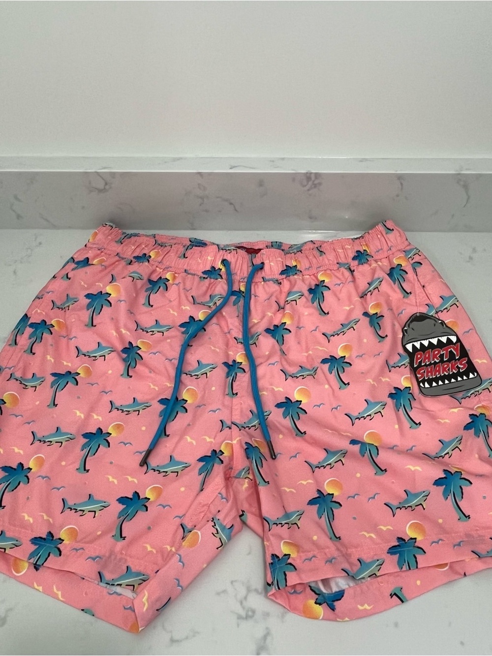 Pink Palm-Print Men’s Swim Trunks